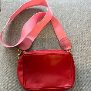 Clare V midi-sac red leather pink strap (20 in) worn twice. Like new condition.